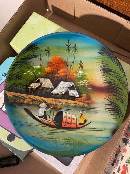 Decorative plates and vintage books