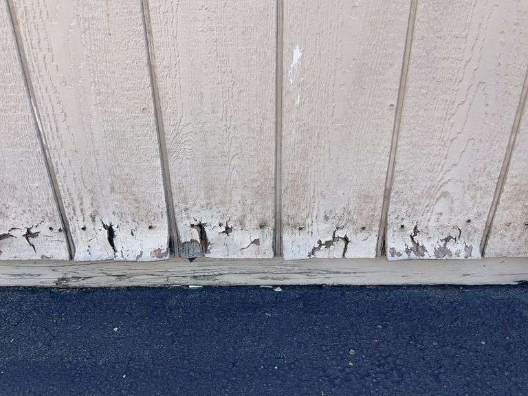 10x12 tan and red storage barn - contents not included