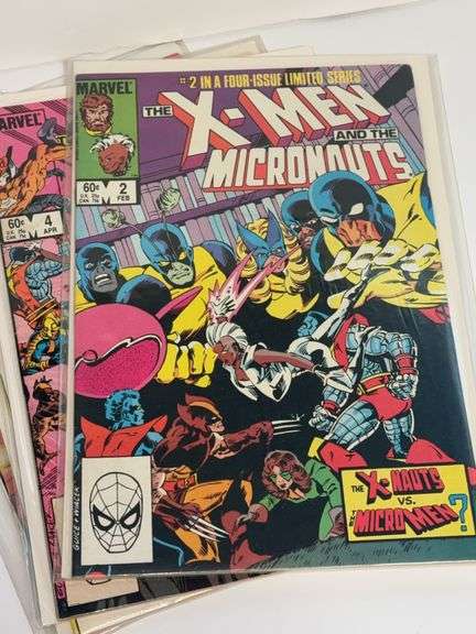 (8) X-Men Comic Books