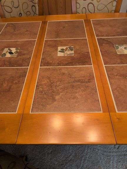 Matching dining table and (6) swivel chairs