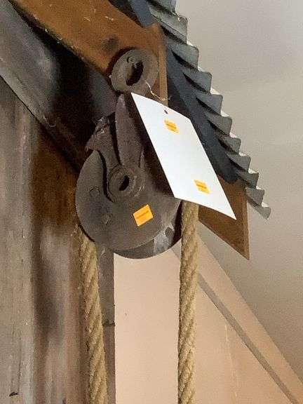 Metal framed with wooden roller rope block