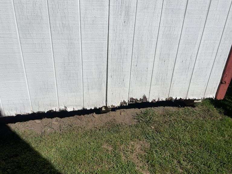 8x12 White and red storage barn - contents not included