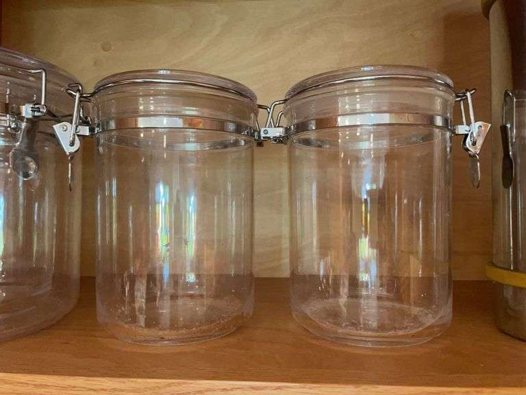 (4) plastic food storage containers, thermos, and (2) small jars