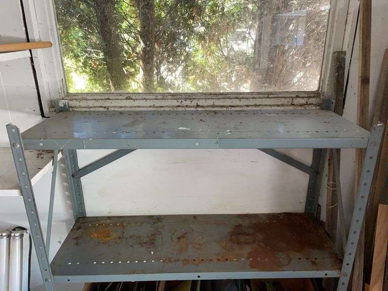 Metal storage shelf w/ slate pieces & bricks