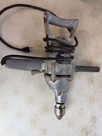 Small propane heater, carpenter's squares, and drill
