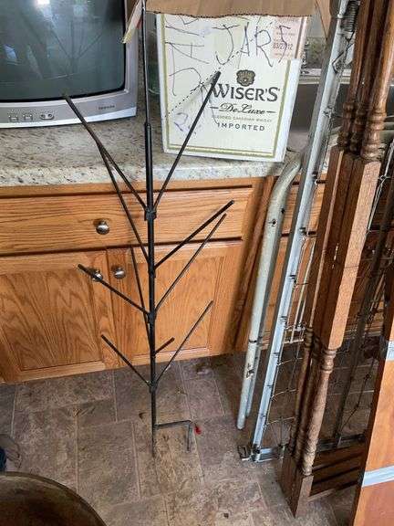 Box of empty wine bottles & decorative rack