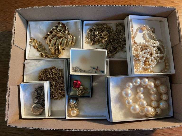 Flat of costume jewelry - mostly necklaces