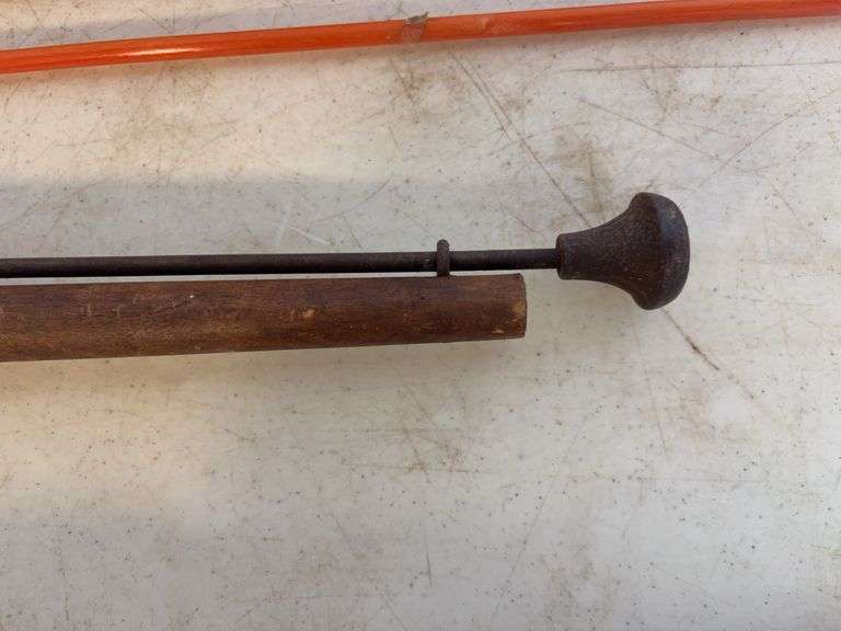 Yard markers, decorative shovel, branch trimmer, and antique piece