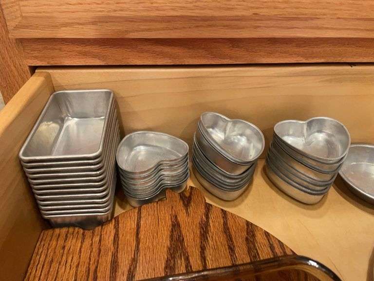 Anchor ovenware casserole dish, pig cutting board, tin molds & other dishes