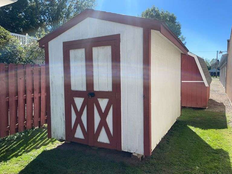 8x12 White and red storage barn - contents not included