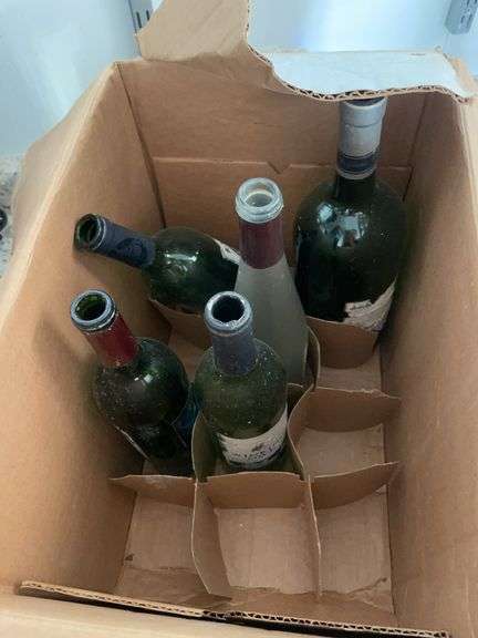 Box of empty wine bottles & decorative rack