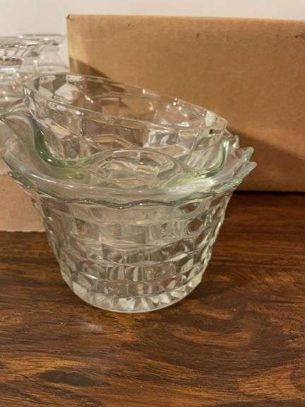 Assortment of clear glassware - cups, dishes, bowls, and more