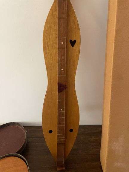 Vintage mountain dulcimer and small guitar