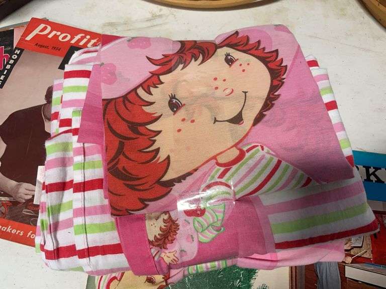 Baskets, cloth, and antique magazines