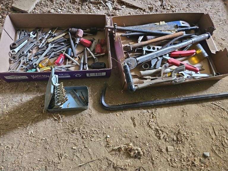 (2) flats misc tools- includes pry bar, wrenches, torque wrench