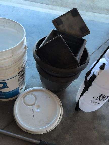 (2) 5 gallon buckets with lids, flower pots, sprayer, and hose nozzle