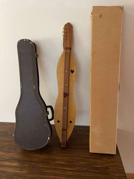 Vintage mountain dulcimer and small guitar