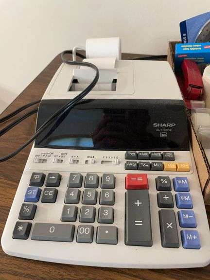 Adding machine and (2) flats of office supplies