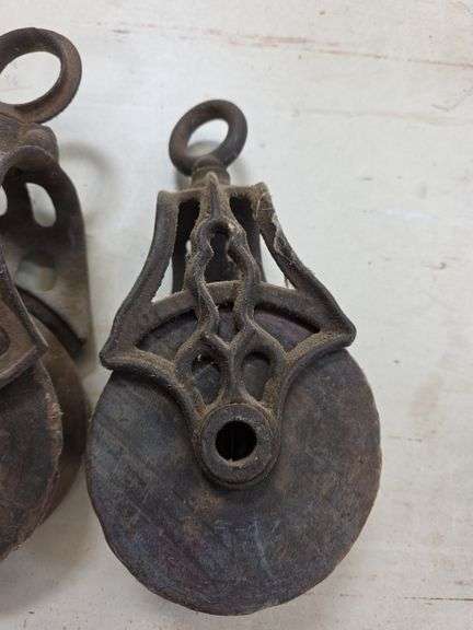 2 wooden pulleys & tongs