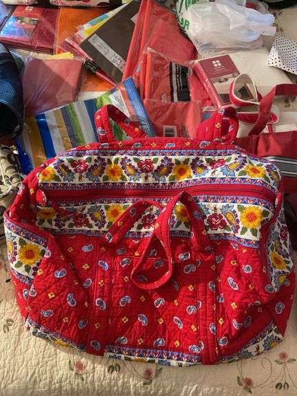 Large assortment of purses, tablecloths, and storage bags