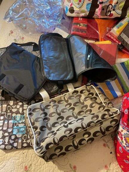 Large assortment of purses, tablecloths, and storage bags