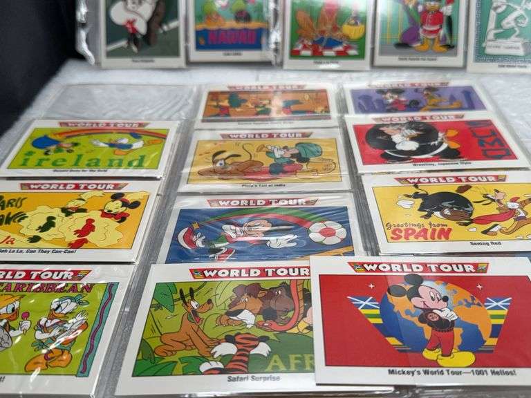 Assortment of World Tour  Disney Cards In Protective  Sheets