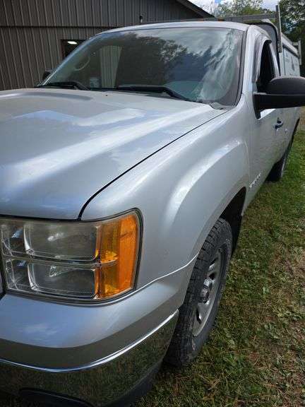 2012 GMC Sierra 1500 4x4 w/ toolbox cap. Runs good. Has a weak battery.
