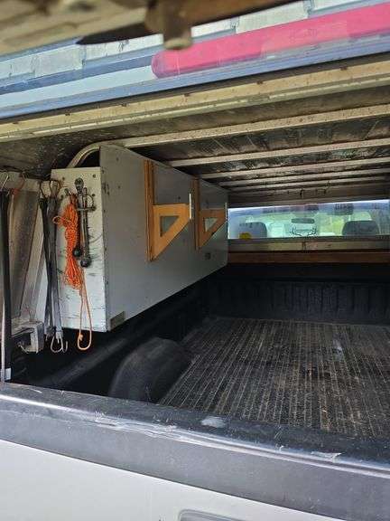 2012 GMC Sierra 1500 4x4 w/ toolbox cap. Runs good. Has a weak battery.