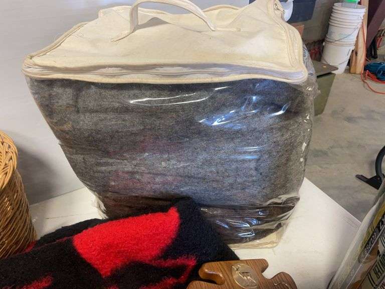 Blankets, seat cushions, Easton trash bin, and basket