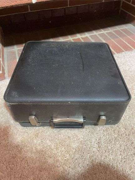 Antique Adler typewriter with case