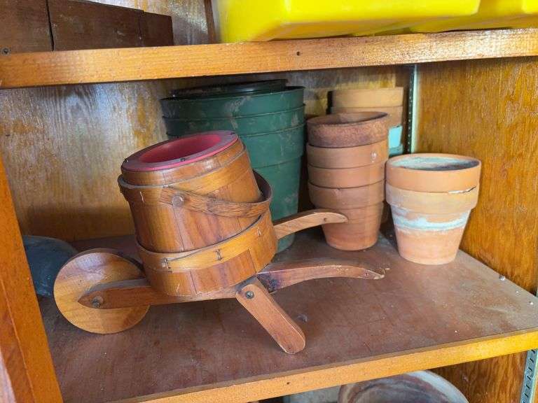 (3) shelves of gardening items including planters, sprinklers, small hose & more