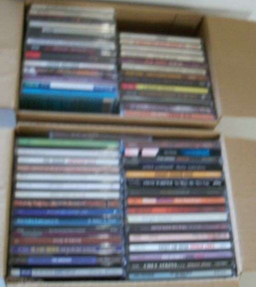 2 BOXES OF CDs
