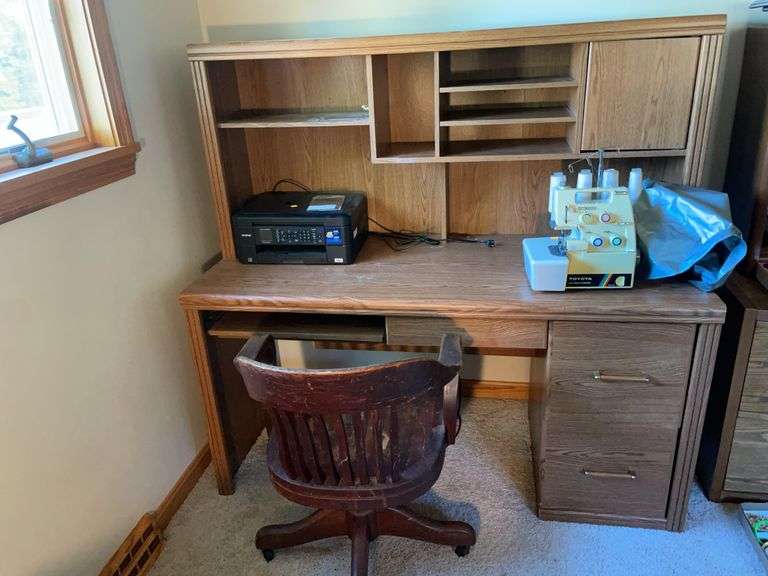Wooden office desk and chair - buyer responsible for removal. -Contents not included.