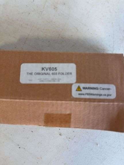 John Deere plate, die-cast model car, and International model tractor