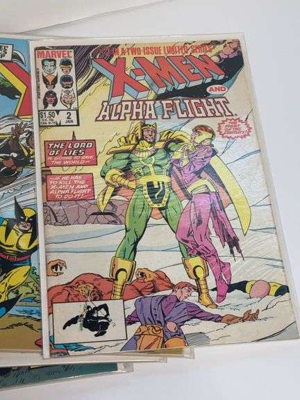(8) X-Men Comic Books