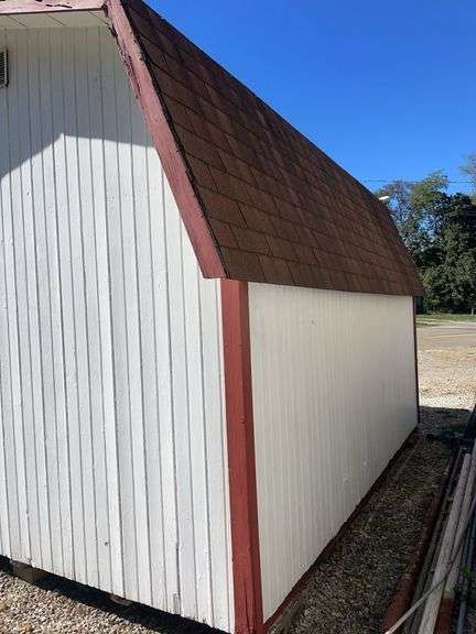 10x14 White and red storage barn - contents not included