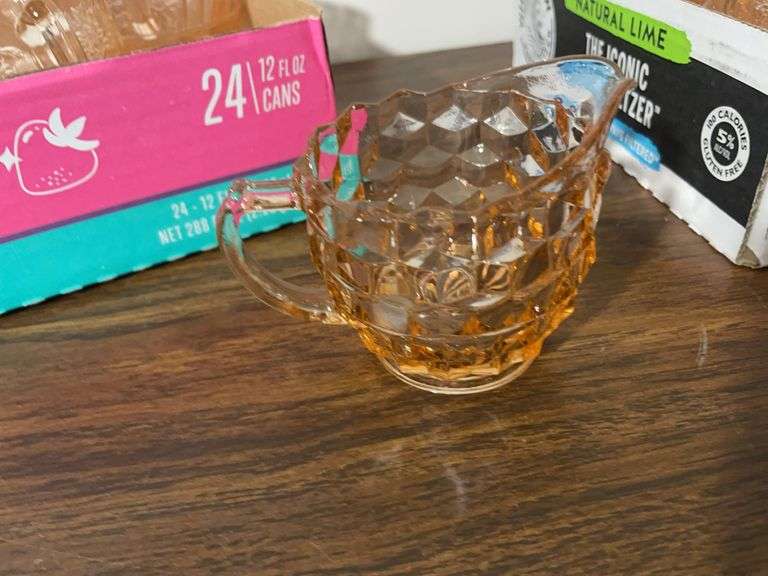 Pink depression glass mugs and sugar/cream containers