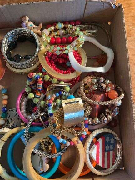 Flat of costume jewelry - mostly bracelets