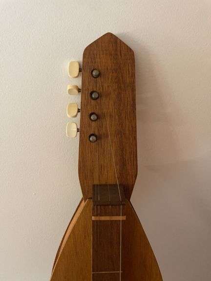 Vintage mountain dulcimer and small guitar