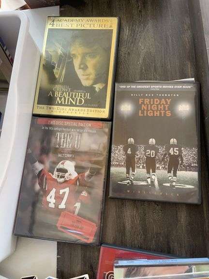 Lot of games & movies including card shuffler, playing cards, LCR & others