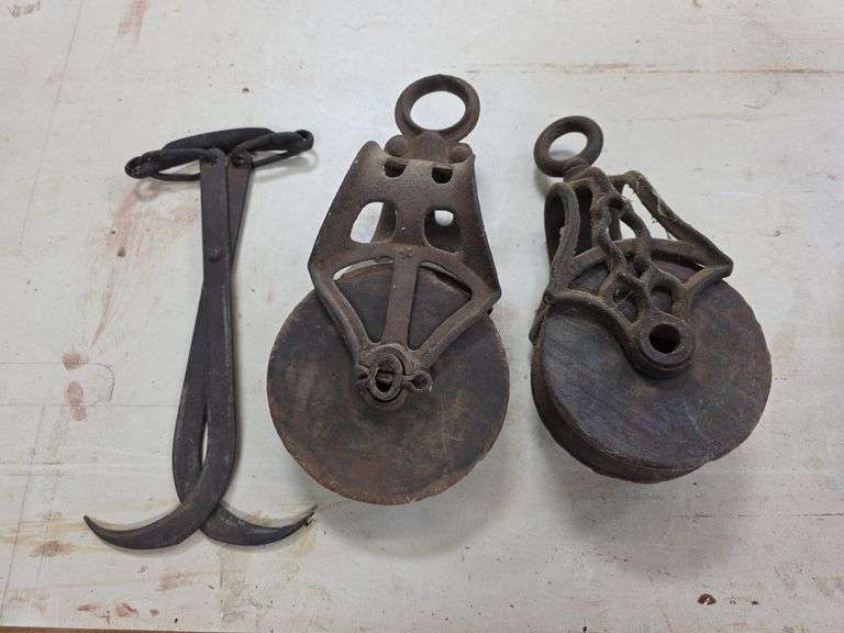 2 wooden pulleys & tongs
