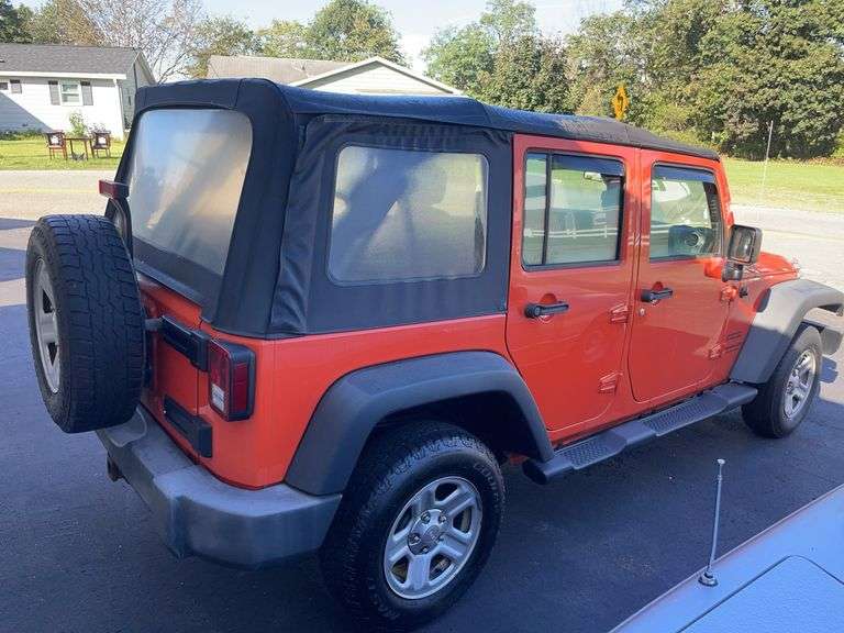 2015 Orange 4D Jeep Wrangler