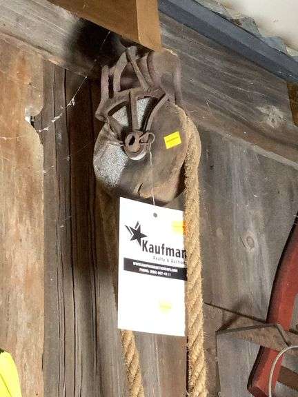 Metal framed with wooden rope block