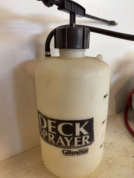 Propane tank with torch, deck sprayer, and level