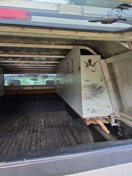 2012 GMC Sierra 1500 4x4 w/ toolbox cap. Runs good. Has a weak battery.