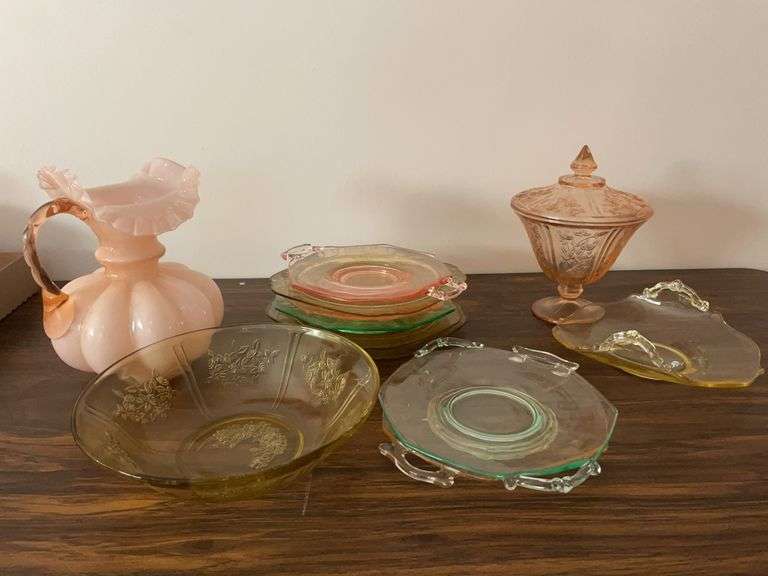 Yellow, pink, and green depression dishes and pink pitcher