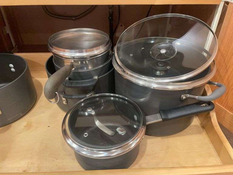 Kitchen drawer w/ mostly pots & lids
