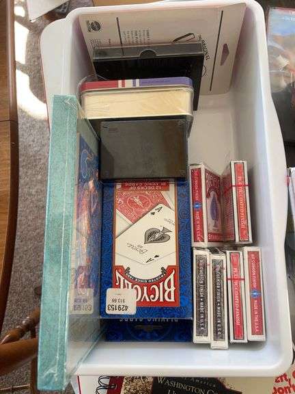 Lot of games & movies including card shuffler, playing cards, LCR & others