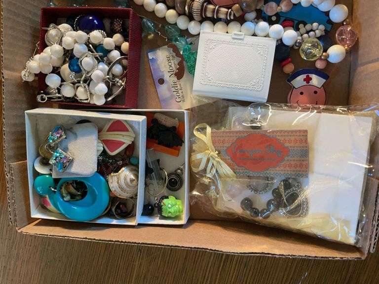 Flat of costume jewelry - mostly necklaces