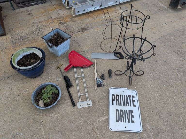 Flower pots, private drive sign, saw, and more